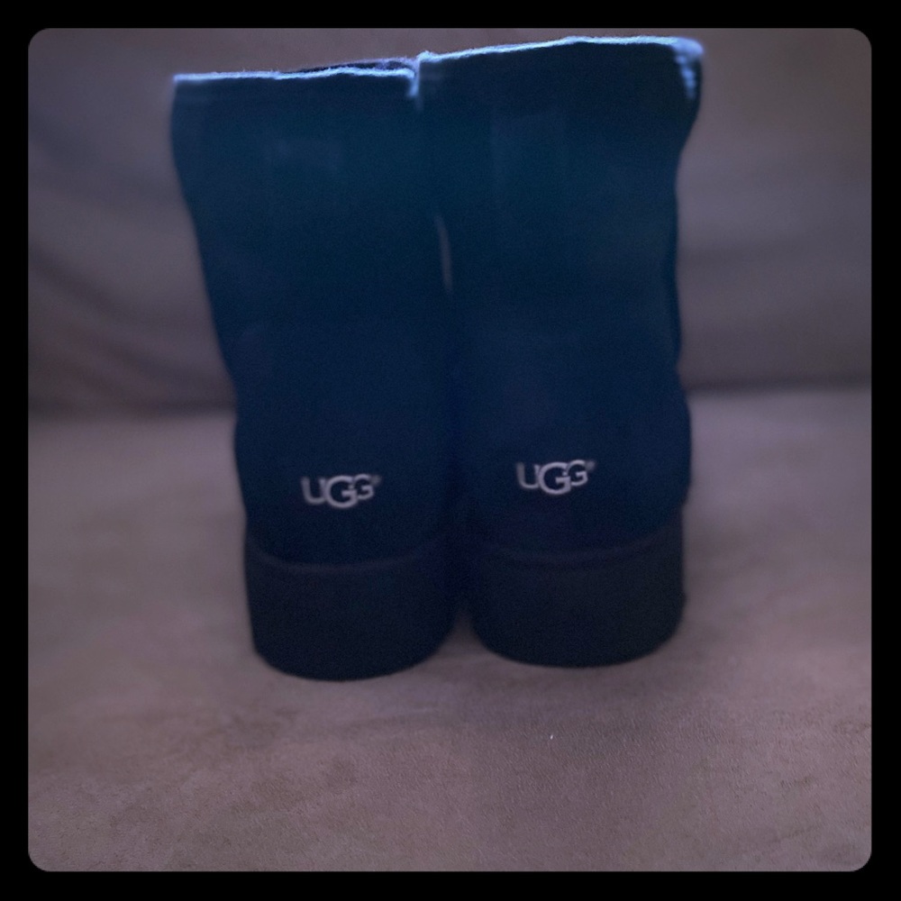 Black UGG sheepskin size 9 boots.
